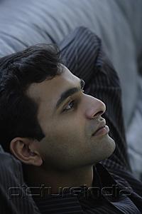 PictureIndia - Profile of Indian man wearing black.