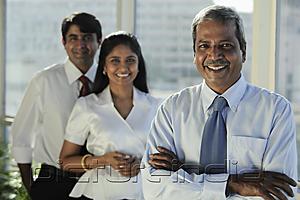 PictureIndia - Three Indian business people smiling together