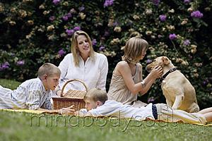 Mind Body Soul - mother with children and dog having picnic