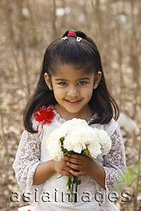 Asia Images Group - Little girl in white dress holding bouquet (portrait)
