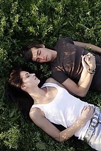 Mind Body Soul - Young couple lying in field