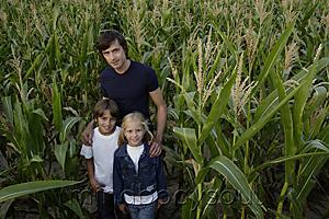 Mind Body Soul - father with daughter and son standing in corn field