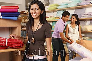 Asia Images Group - three people shopping in household store