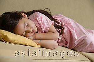 Asia Images Group - girl sleeping on couch