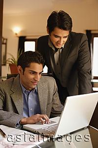 Asia Images Group - two men working at laptop