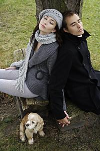 Mind Body Soul - Young couple sitting under tree, with dog