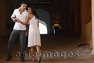 Asia Images Group - couple wearing white, smiling