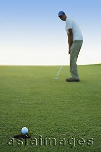 Asia Images Group - man playing golf