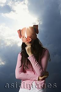 Asia Images Group - lady wearing pig mask
