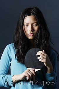 Asia Images Group - young lady holding ping pong bat