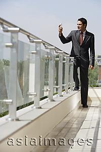 Asia Images Group - businessman on balcony