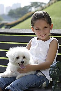 Mind Body Soul - young girl holding puppy on her lap