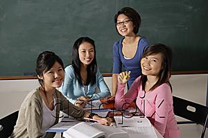 AsiaPix - Four women studying together.
