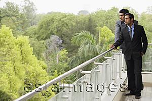 Asia Images Group - businessmen standing on balcony