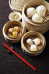 AsiaPix - Assortment of dim sum in bamboo steamers.
