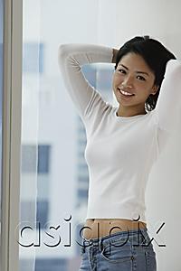 AsiaPix - Young Asian woman holding up hair