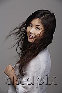 AsiaPix - Chinese woman with long hair, smiling