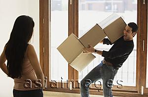 Asia Images Group - young couple moving into new home