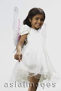 Asia Images Group - little girl dressed in white dress and wings