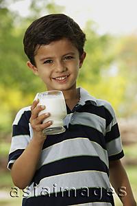 Asia Images Group - boy with glass of milk