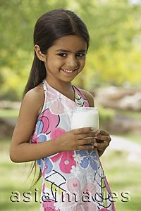 Asia Images Group - little girl with glass of milk