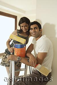 Asia Images Group - Young couple painting
