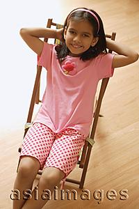 Asia Images Group - Little girl in chair