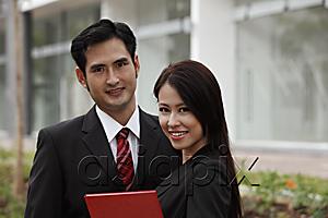 AsiaPix - Head shot of man and woman in suits