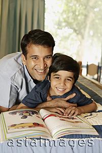 Asia Images Group - father and son reading book