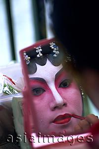 Asia Images Group - China,Hong Kong,Portrait of Chinese Opera Actress Applying Make-up