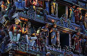 Asia Images Group - Close up of carvings on Hindu temple at night
