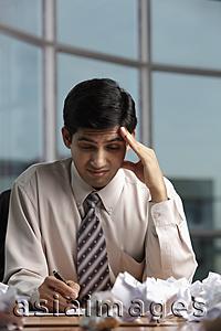 Asia Images Group - Indian man stressed at work