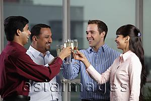 Asia Images Group - Mixed raced group toasting eachother