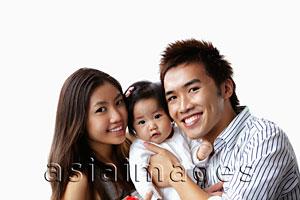 Asia Images Group - mother and father holding baby and smiling