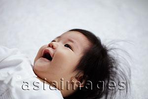 Asia Images Group - Chinese baby laying on back smiling