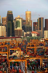 Asia Images Group - Singapore skyline with shipping containers in foreground
