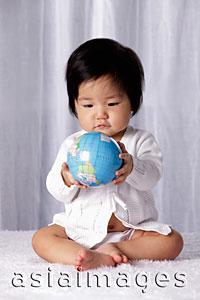 Asia Images Group - Chinese baby holding small globe