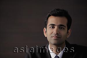 Asia Images Group - Head shot of young man looking at camera