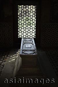 Asia Images Group - Light coming though carved stone window onto a tomb. Itmad-Ud-Daulah's Tomb, Agra, India
