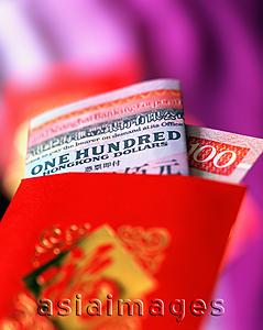 Asia Images Group - China, Hong Kong, Hong Kong dollar in red packet