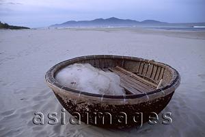 Asia Images Group - Vietnam, Danang, bamboo fishing boat on China Beach.