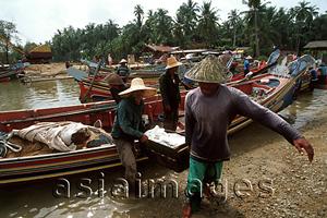 Asia Images Group - Malaysia, Kota Bahru, fisherman at shore.