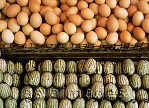 Asia Images Group - China, Hong Kong, Regular eggs (top) and century eggs