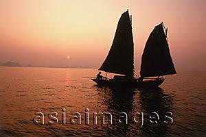 Asia Images Group - Vietnam, Halong Bay, Fishing junk at dawn