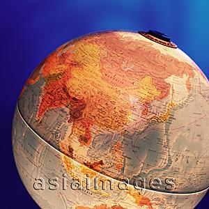 Asia Images Group - Globe, focus on China, blue background