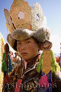 Asia Images Group - China, Szechuan (Sichuan), Kham region, Lama wearing traditional decorations.