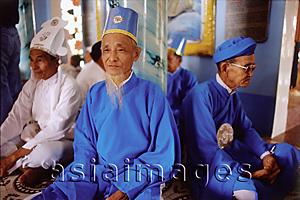 Asia Images Group - Vietnam, Tay Ninh, Priests and worshippers at Cao Dai Temple.
