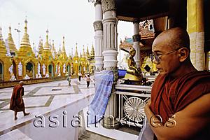 Asia Images Group - Myanmar (Burma), Yangon (Rangoon), Monks at the Shwedagon Pagoda.