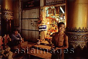 Asia Images Group - Myanmar (Burma), Yangon (Rangoon), Two men inside the Shwedagon Pagoda.