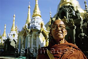 Asia Images Group - Myanmar (Burma), Yangon (Rangoon), Portrait of Buddhist monk at Shwedagon Pagoda